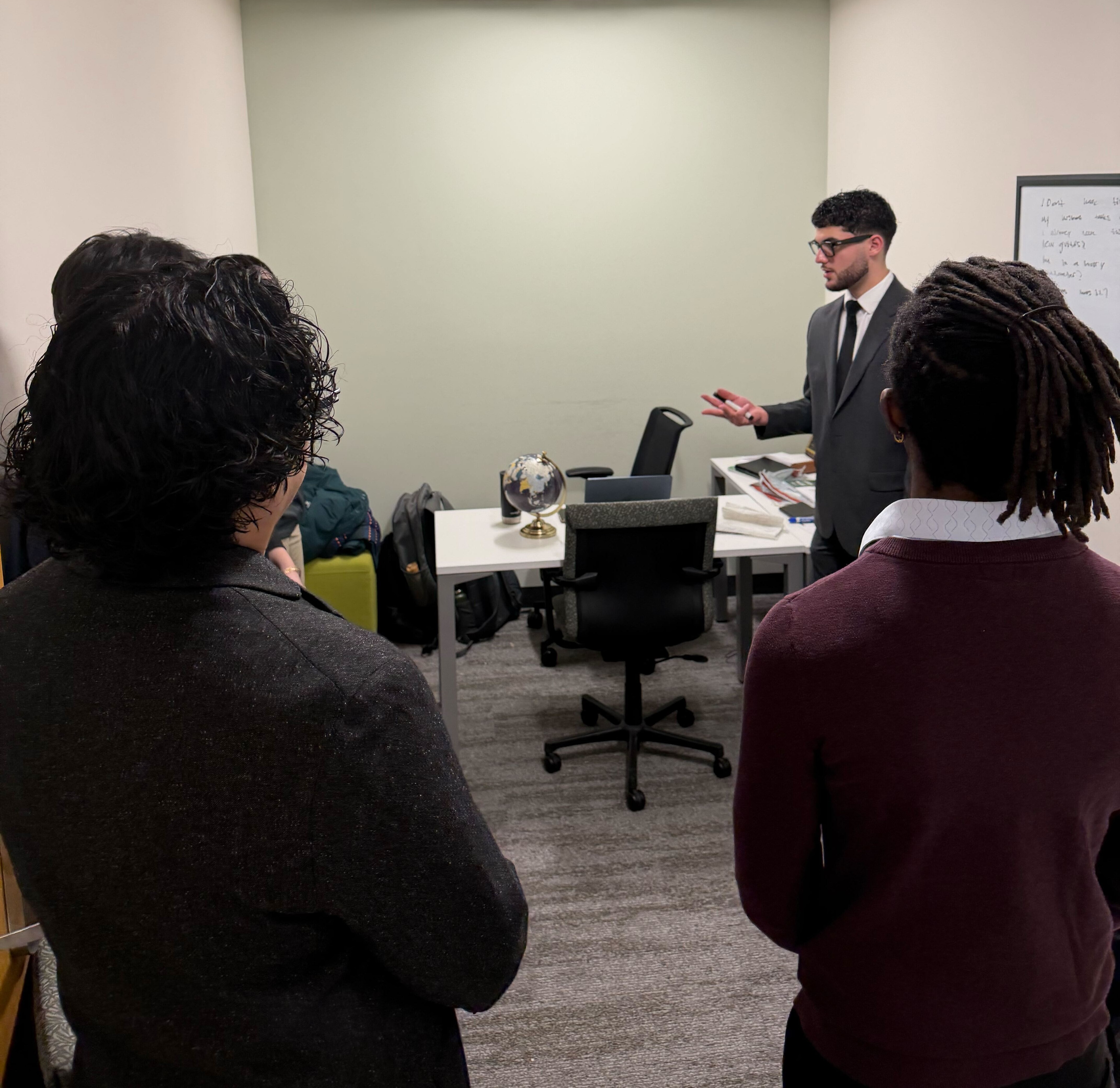 Team members engaged in professional conversation and leadership development